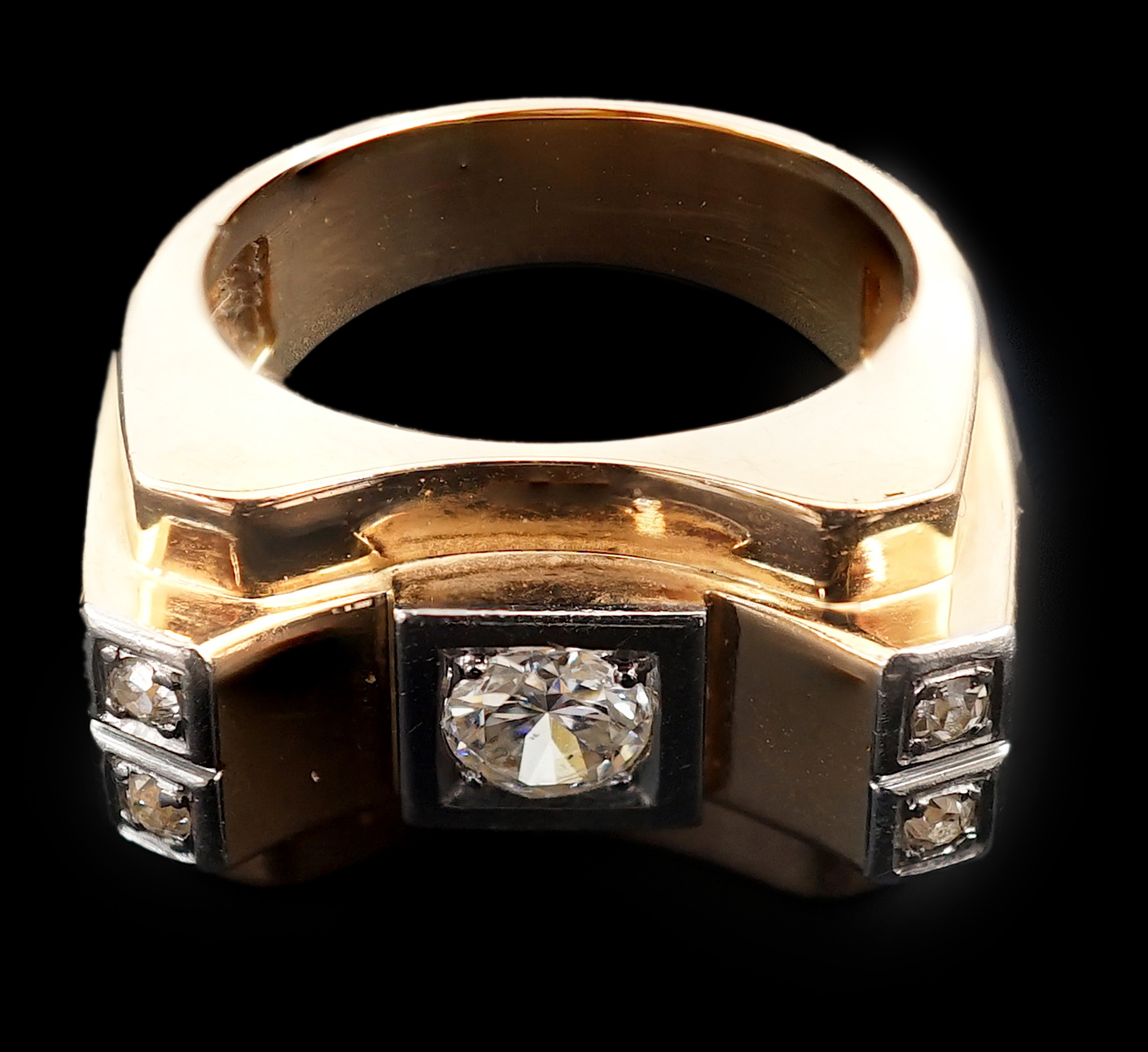 A 1940's 18ct gold and four stone diamond set 'tank' dress ring